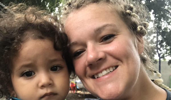 volunteer spending time with child